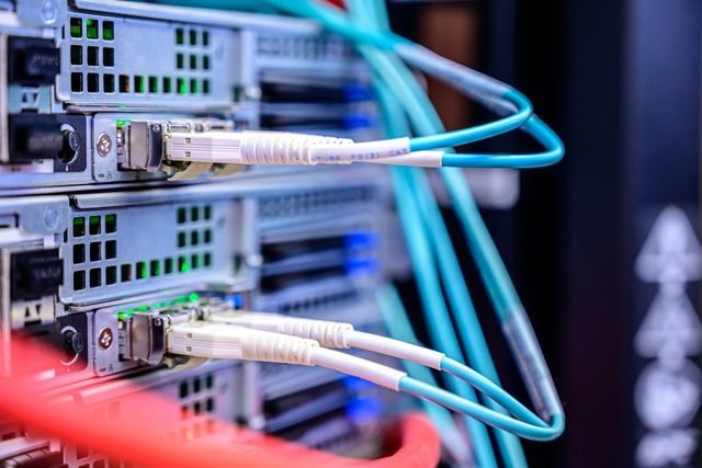 Fibre-optic patch cables on network equipment